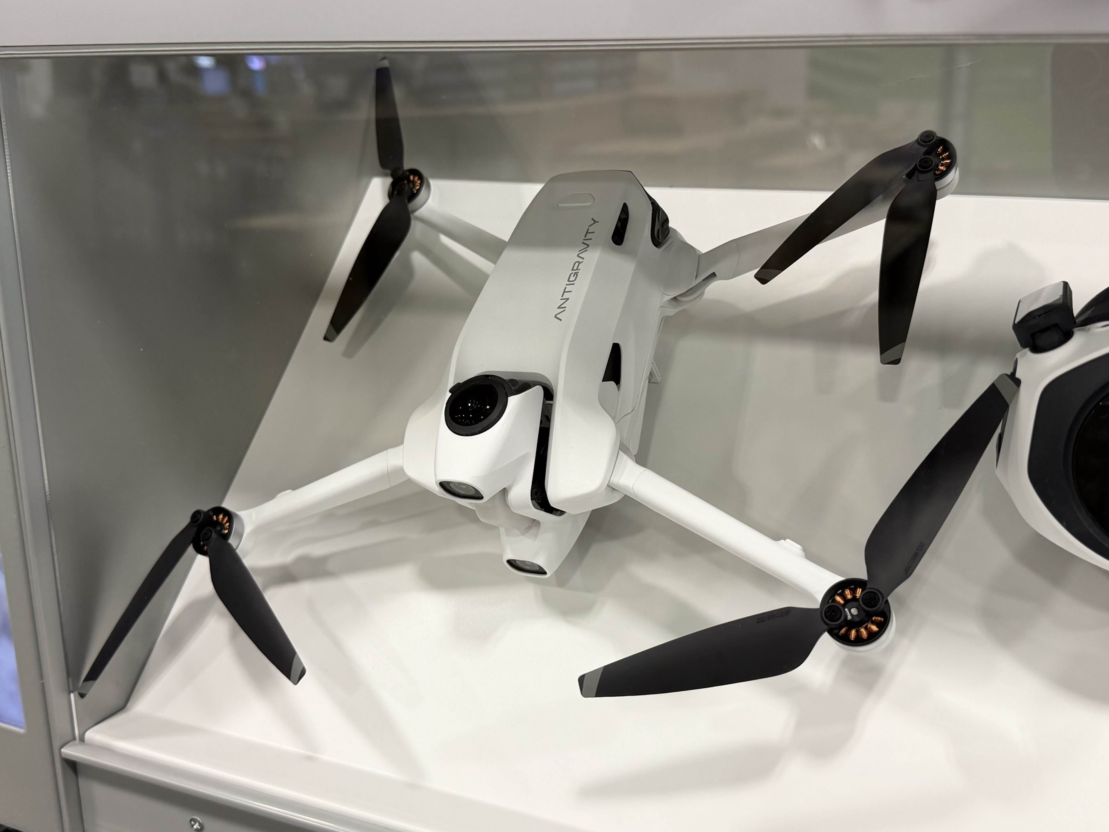 Antigravity A1 drone with unfolded arms in a retail display