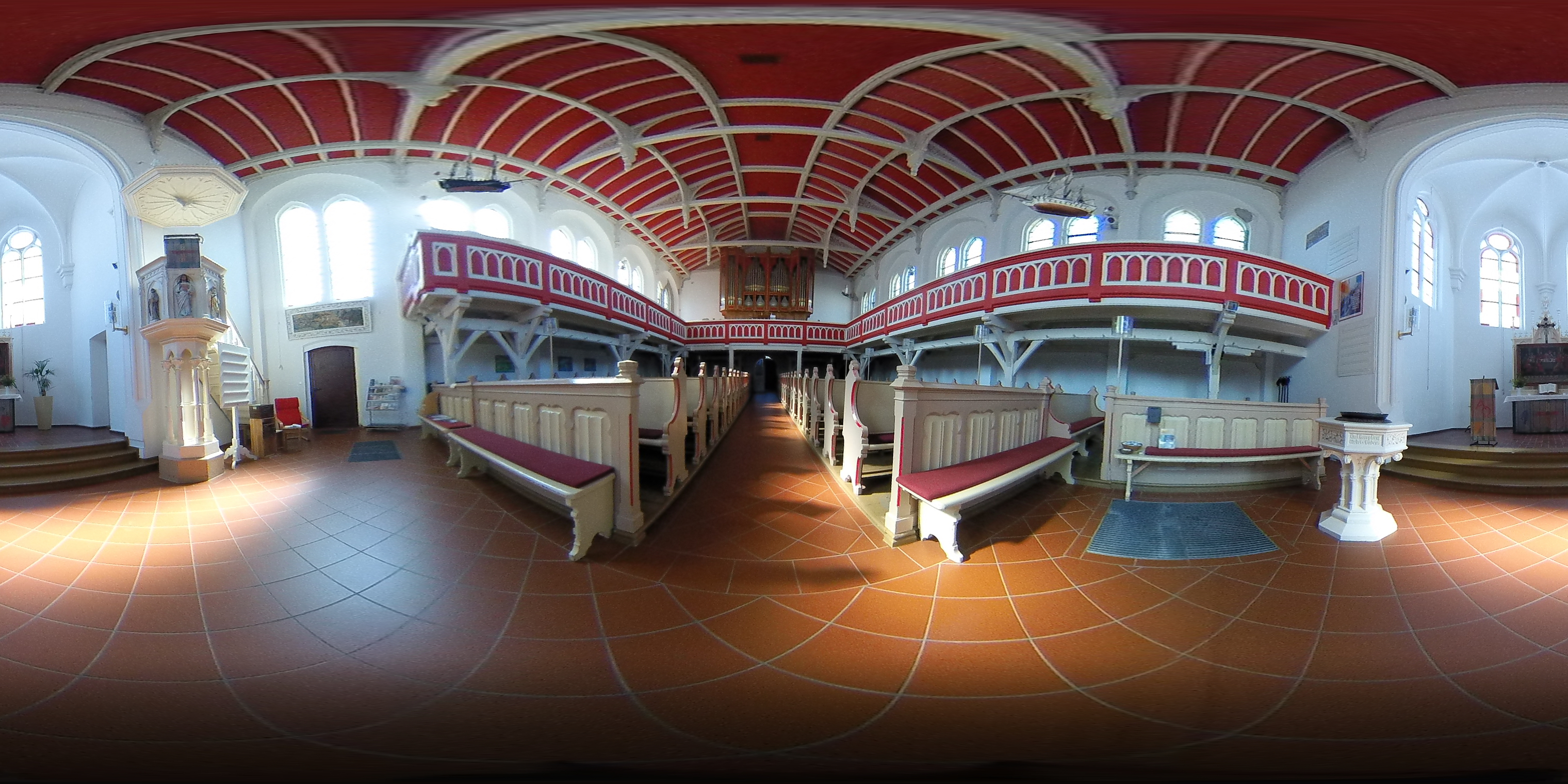 Full-sphere church interior with pews, bright windows and red-and-white ceiling and galleries