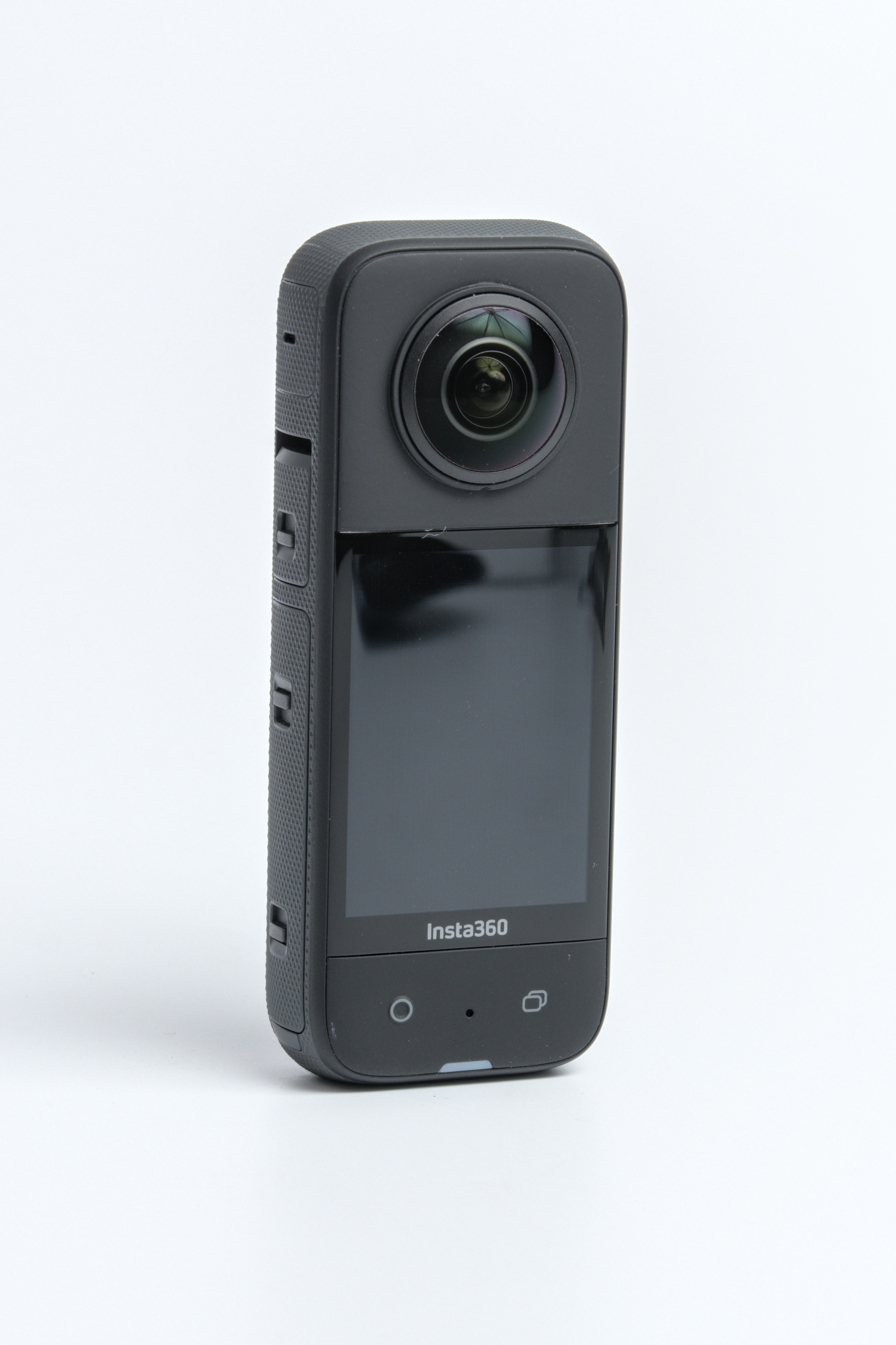 Black Insta360 X3 showing its fisheye lens, large touchscreen and two front buttons