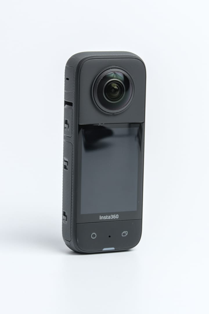 Insta360 X3 with touchscreen and front lens visible