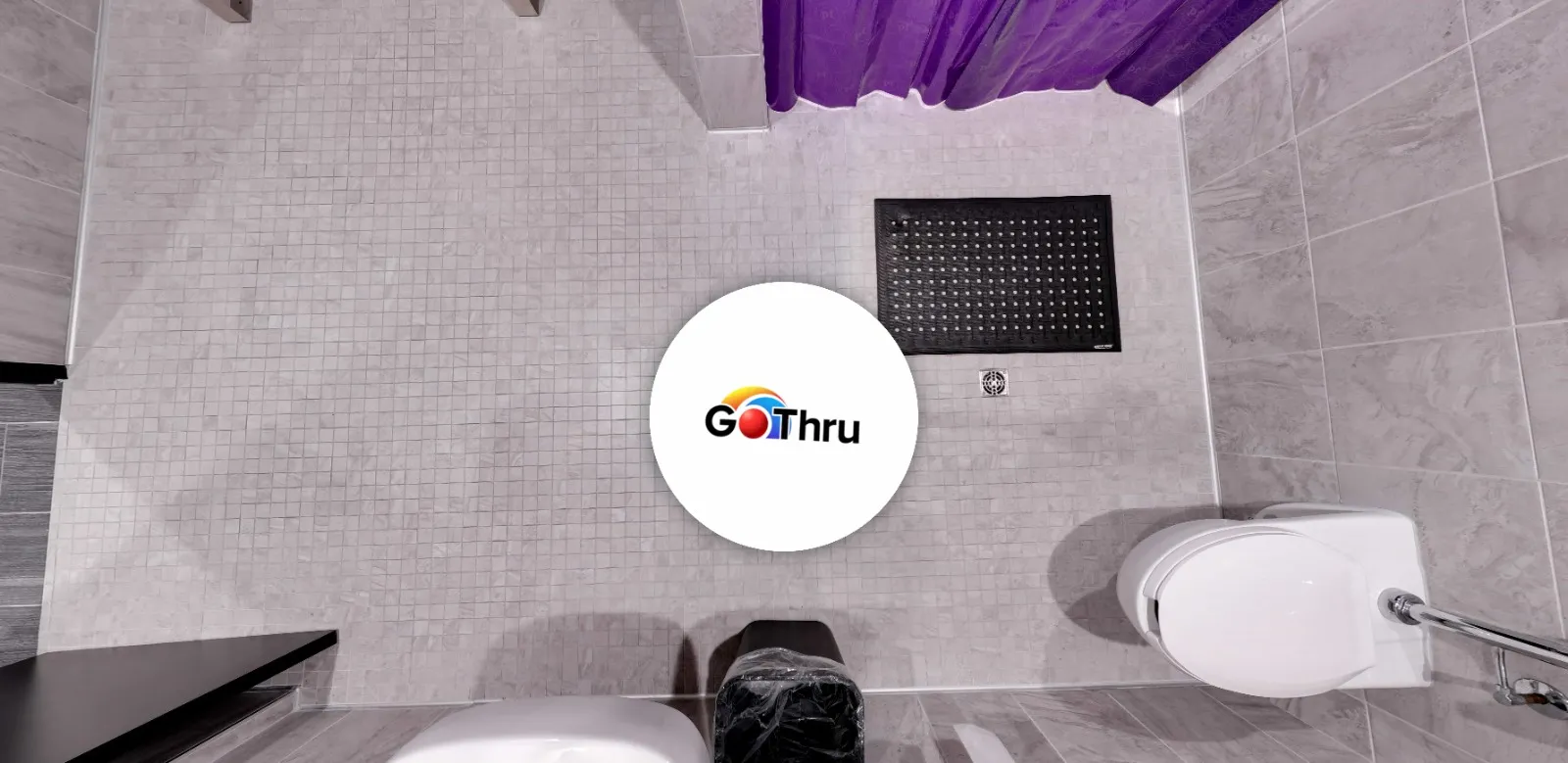 Finished 360 panorama floor view with a circular GoThru logo patch covering the nadir area.